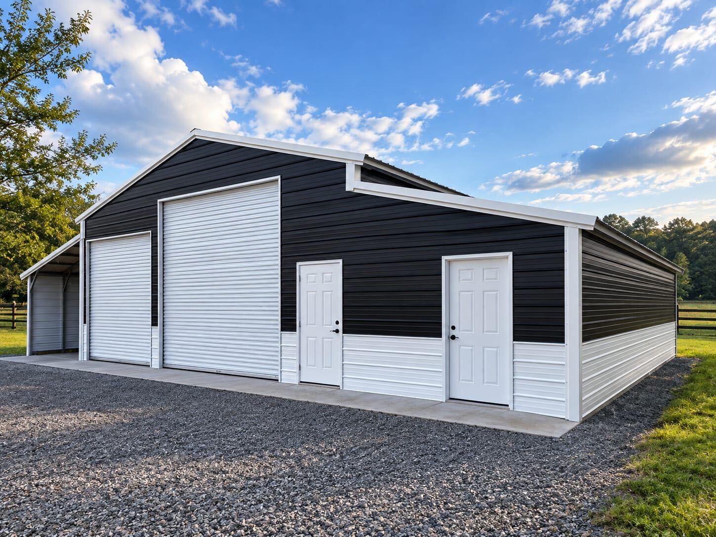 Black metal building with white trim and wainscot, two white roll-up doors, two walk doors, and a lean-to on a gravel pad